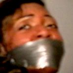 Fourth pic of tied-and-gagged.com | 27 Yr OLD BEAUTY SALON OWNER IS HOG-TIED, BAREFOOT, TOE-TIED, DOUBLE WRAP TAPE GAGGED, ASS SPANKED AND FOOT TICKLED (D75-3)