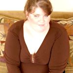 Second pic of Big busty brunette riding a huge cock in the living room -  - Spank It Now!