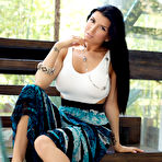 First pic of Busty black haired beauty Romi Rain gets a pussy wedgie -  - Spank It Now!