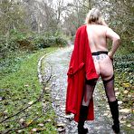 Fourth pic of Saucy British wife in a long red coat flashes her naughty bits in public including her dirty asshole &ndash; Bare Milfs