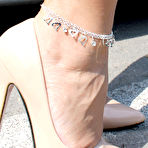 Fourth pic of Risky milf Arabella X lifts her dress in public flashing her pretty pussy &ndash; Bare Milfs