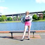 First pic of Mature blonde with long legs wearing a short pink mini skirt flashes her bald pussy in public places &ndash; Bare Milfs