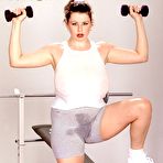 First pic of Brunette MILF Desirae showcases her impressive natural chest while working out intensely | NakedWomenPhotos.net