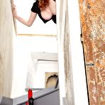 First pic of Redhead Mistress wearing Latex thigh boots squats her pussy down on to her favorite dildos &ndash; Bare Milfs