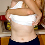 Second pic of Naughty Mag - Veronica Lik - Happily married Taiwanese beauty Veronica diddles her tight cunt in her kitchen with a vibrator