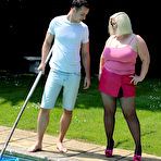 First pic of Fat Milf dressed like a tart drops to her knees and sucks the pool boy off & even lets him spread her legs and push his cock inside her cunt &ndash; Bare Milfs
