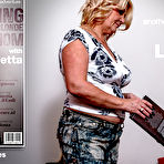 Fourth pic of This toyboy gets seduced by his curvy stepmom Linetta for some hardcore sex in the livingroom - Mature.nl