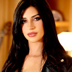 First pic of Kassie Wallis slips out of her leather jacket and provocative lingerie