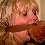 First pic of tied-and-gagged.com | 50 Yr OLD REAL ESTATE AGENT IS TIED UP WITH PACKAGING TAPE, BAREFOOT, TOE-TIED, STINKY PANTYHOSE GAGGED, FEET TICKLED, HOPS ACROSS THE ROOM, HANDGAGGED AND MOUTH STUFFED (D74-7)