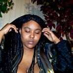 Second pic of Black mature undress pantyhose and shows her round boobs