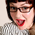 First pic of Mature secretary Satine highlights her big ass after going nude in glasses