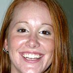 First pic of Amateur chick with long red hair that reaches her tight ass strips naked