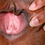 Third pic of Thick black amateur Monique Symone spreads her pussy wide open after disrobing