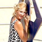 First pic of Blonde woman Molly MILF shows her tits and cunt while at a public beach