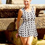 Second pic of Blonde woman Molly MILF shows her tits and cunt while at a public beach