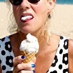 Fourth pic of Blonde woman Molly MILF shows her tits and cunt while at a public beach