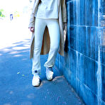 First pic of Charming teen Florens flashes in an overcoat before getting naked