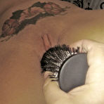 Third pic of Tattooed blonde Morisa is tickled and masturbated while tied to a bed