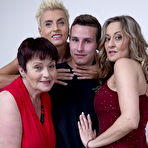 Second pic of Three mature housewives share a toy boy while having sex on a couch