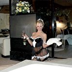 First pic of Blond maid Naughty Julie masturbates her soap covered twat on the side of tub