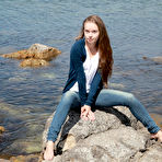 First pic of Skinny girl Milena D sheds jeans on beach to show bald twat underwater