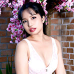 First pic of Dark haired Asian beauty Norah bathes naked in a wooden tub