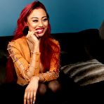 Second pic of Redhead woman Bunny Mckenzie gets partly disrobed while watching a man jerkoff