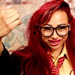 Third pic of Redheaded coed Bunny Mckenzie flashes her upskirt underwear on a chair