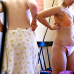Second pic of Spy camera catches two lesbians getting dressed after having sex