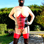 First pic of Amateur chick Mary Bitch sports a ski mask while toying her snatch on a lawn