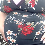 First pic of Pregnant redhead Georgia Peach takes her dress off and poses naked on the sofa