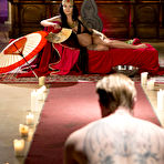Fourth pic of Tattooed brunette has her male sub worship her while heavily pregnant