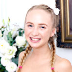 Fourth pic of Young looking girl exposes her tan lined body in white schoolgirl socks