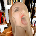 Second pic of Redhead woman Eva Berger adorns herself in many layers of pantyhose