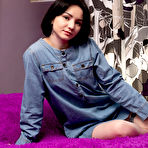 First pic of Petite college girl Naja parts her tight pussy lips after getting naked in bed