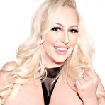 Third pic of Platinum blonde Stassi Rossi bares her enhanced boobs and butt while changing