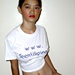 First pic of Young Filipina girl Alma Chua fondles her full breasts while getting naked