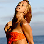 Fourth pic of Fitness model Sarah Evangelista poses in a bikini while at the ocean