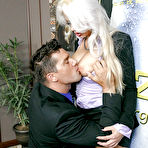 Second pic of Blonde secretary Holly Heart uses oiled feet to jerk cock in office