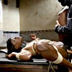 Fourth pic of Ebony sex slave gets fucked hard while restrained in bondage