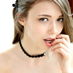 Fourth pic of Beautiful teen frees her natural tits from a sweater before spreading her twat