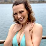 Third pic of Sexy MILF Lily Love removes a bikini before sporting cum all over her face