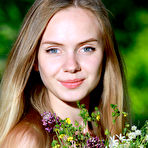 First pic of Sweet teen girl puts down her flowers and proceeds to model in the nude