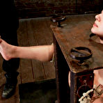 Third pic of Restrained girl is forced to provide oral sex in a windowless basement