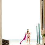 Second pic of Amazing wet babe Remi showing that beautiful body on the beach