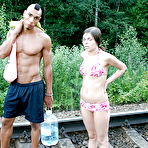 First pic of Teenage slut in bikini gets picked up and fucked by two guys outdoor