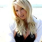 Third pic of Natural blonde Rachel Love exposes her great tits while at the beach