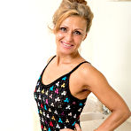 First pic of Older housewife with tiny tits fingers spreads her bush in her nude debut