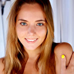 First pic of Totally naked teen Mango A spreads her long legs to show her yummy pussy