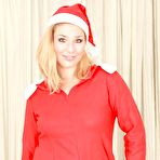 First pic of Blonde Gina Delight shows us her big hairy pussy without skirt